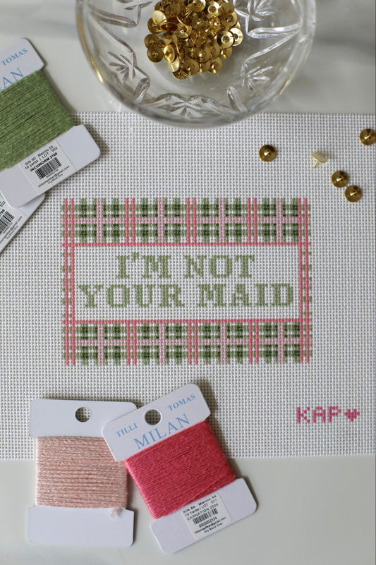 Angled view of I'm Not Your Maid needlepoint canvas for laundry room or mudroom