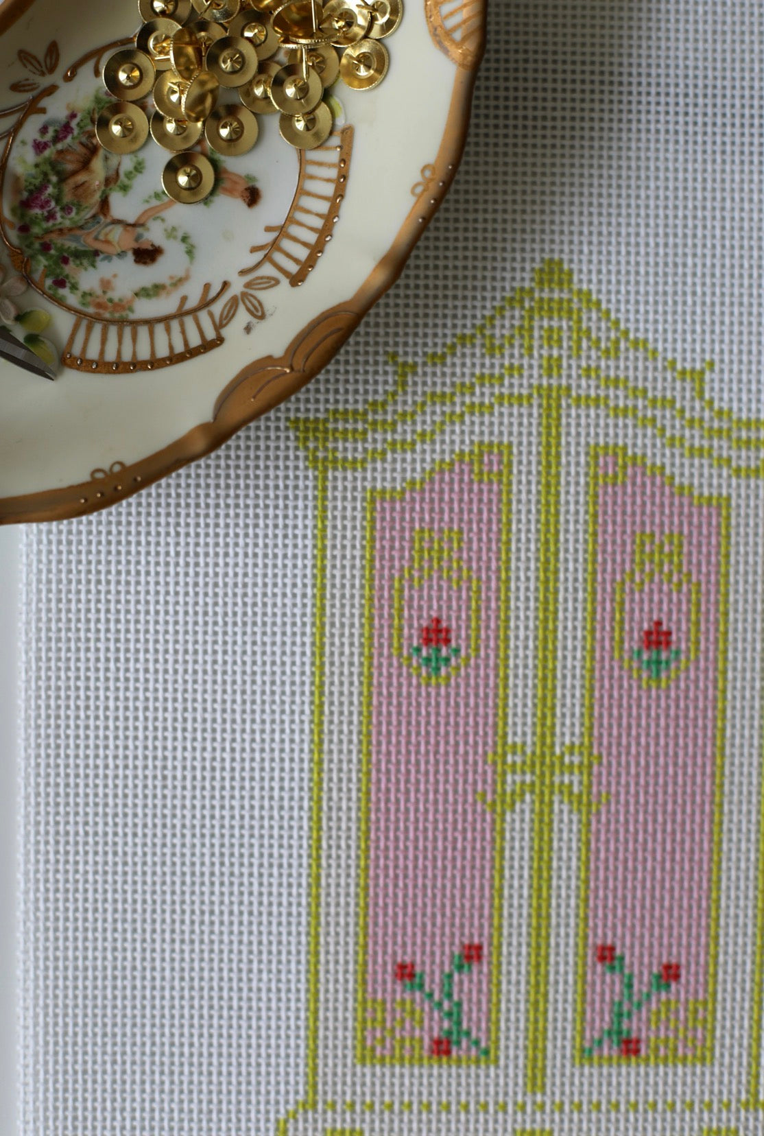 Detail view of The Armoire needlepoint canvas design with classic old-world styling